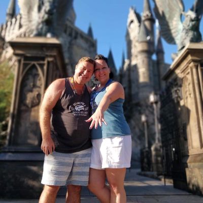 Getting engaged in front of Hogwarts Castle at Universal Orlando